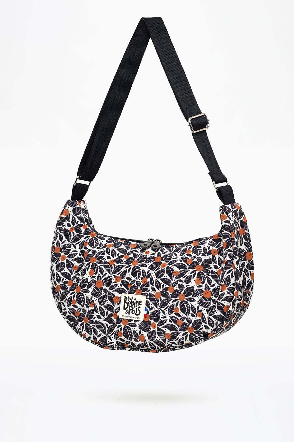 sac banane demi lune MiMoon AVA en tissu recyclé à motif feuillage noir et camel