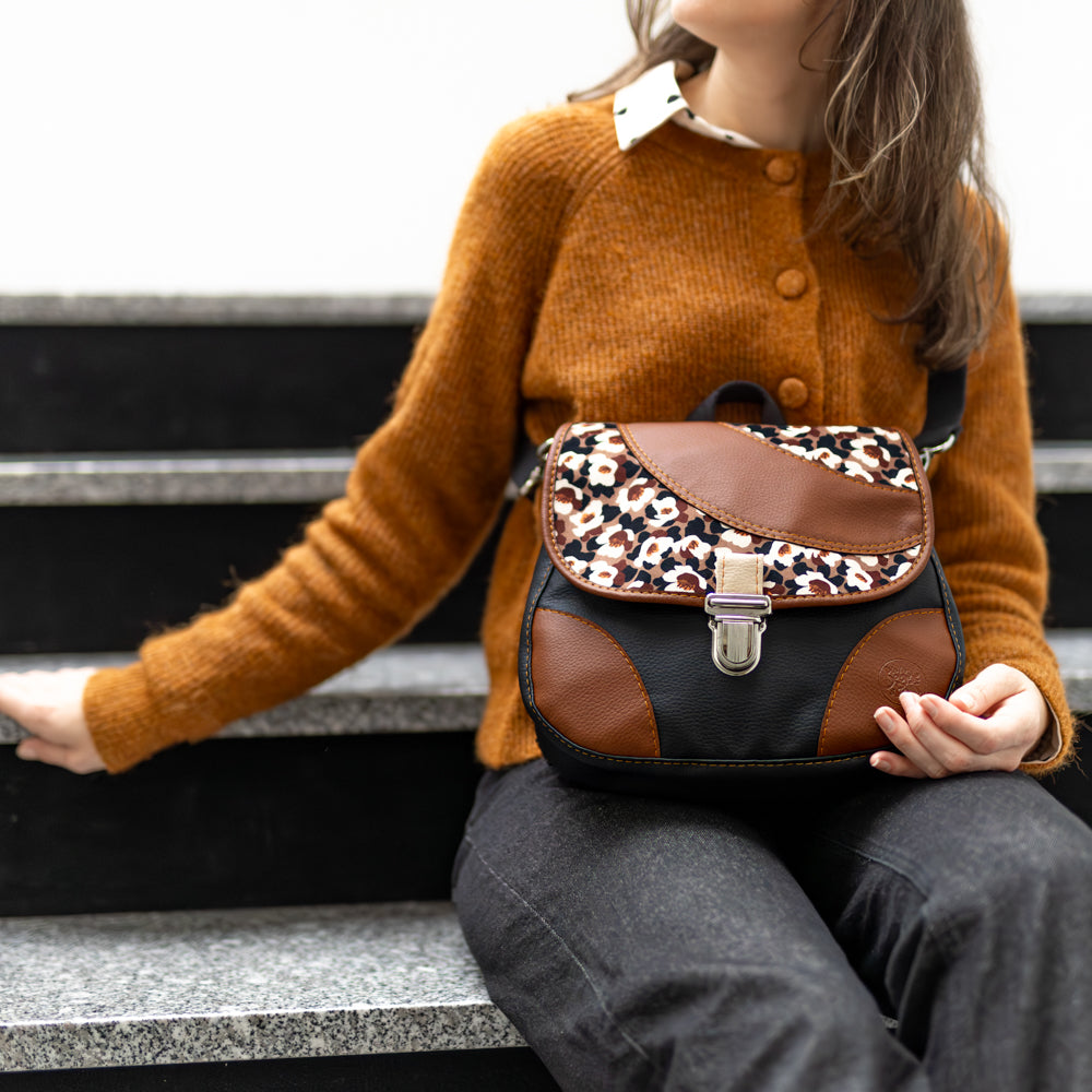 
                      
                        Sac à dos convertible Roomi MIRA
                      
                    